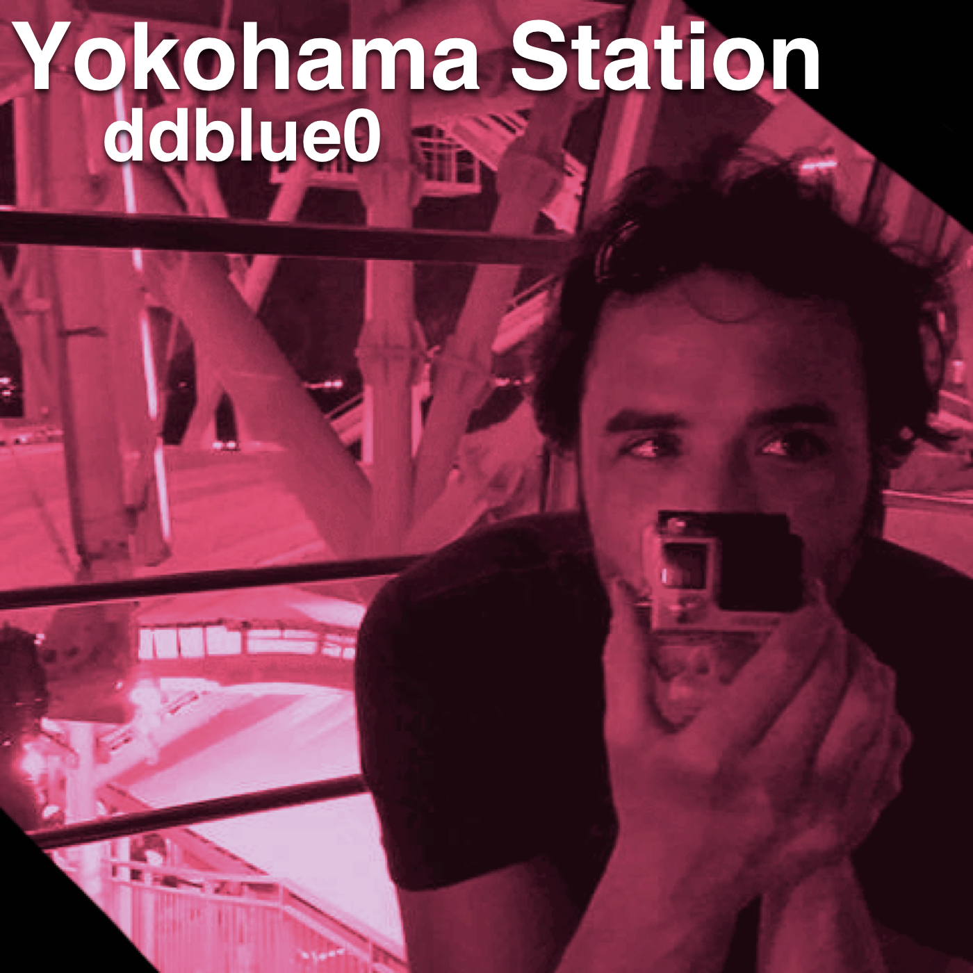 A picture of a man holding a camera representing the Yokohama Station project